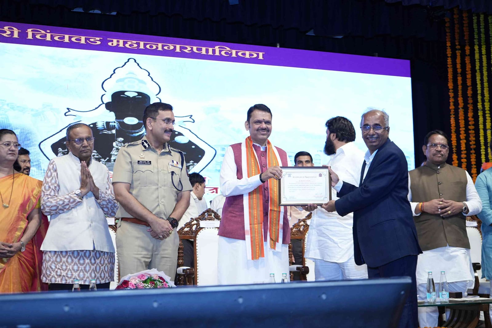 CM Devendra Fadnavis felicitating Dr. Mahesh Goudar